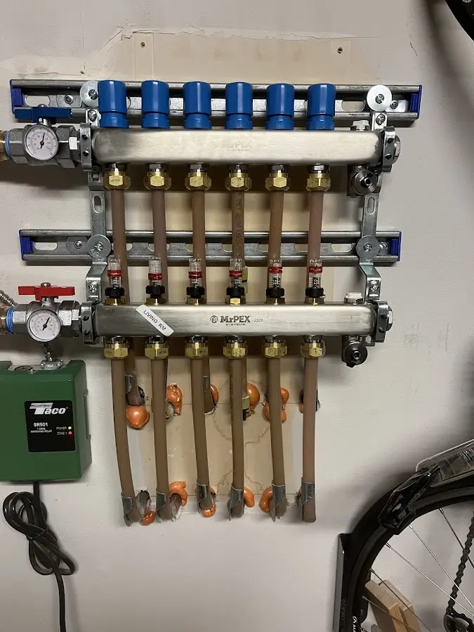 Plumber performing Gas Leak Detection at a residential property in Freeport